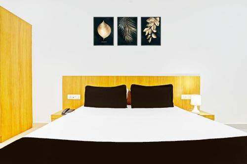 Super Hotel O Raipurにあるベッド