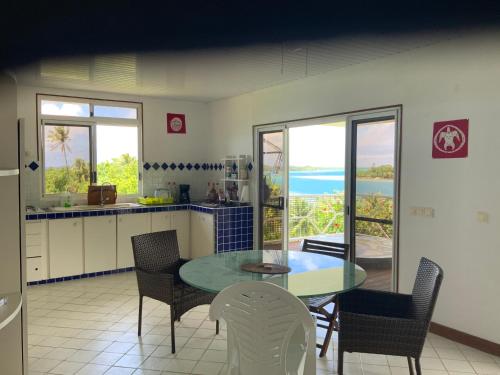 Kuchyň nebo kuchyňský kout v ubytování Maison avec vue exceptionnelle lagon et mer, accès privé lagon