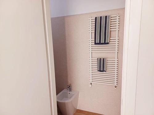 a bathroom with a toilet and a sink at Villa MARGHERITA in Pratola Peligna