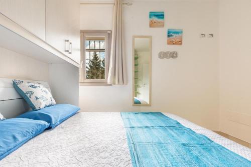 Ένα ή περισσότερα κρεβάτια σε δωμάτιο στο Villa Smeralda