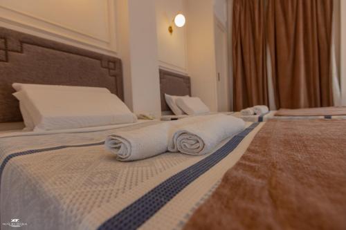 Ένα ή περισσότερα κρεβάτια σε δωμάτιο στο El Farida Hotel