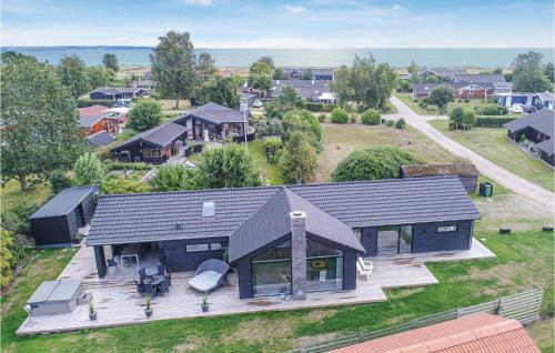 an aerial view of a house with a deck at Lovely Home In Juelsminde With Wifi in Juelsminde