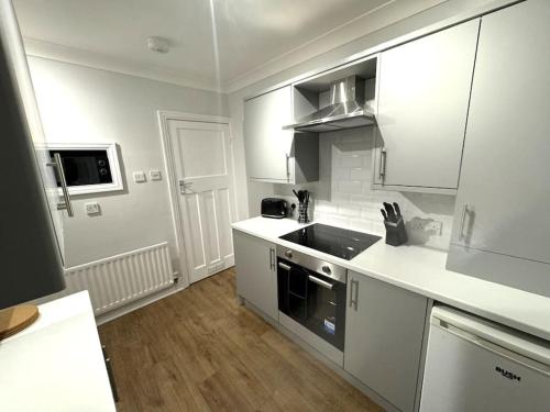 Η κουζίνα ή μικρή κουζίνα στο Kentmere Apartment