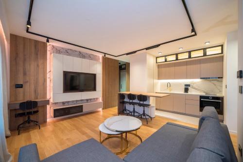 Kuchyň nebo kuchyňský kout v ubytování Apartment Legacy