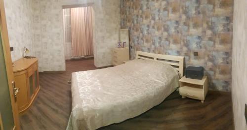 Postel nebo postele na pokoji v ubytování Murad Əmlak Agentliyi