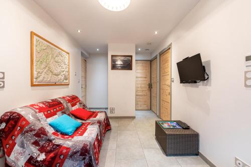 Μια τηλεόραση ή/και κέντρο ψυχαγωγίας στο Appartement - Lanslevillard