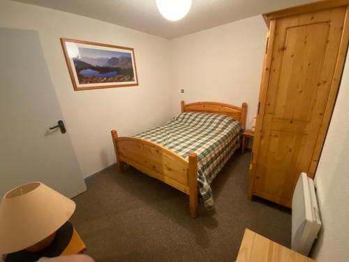 Giường trong phòng chung tại Appartement Pyrénées -Sainte-Marie de Campan