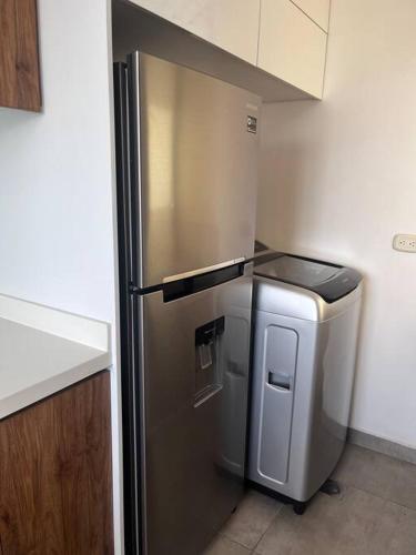 Η κουζίνα ή μικρή κουζίνα στο Yumbo apartment Completo