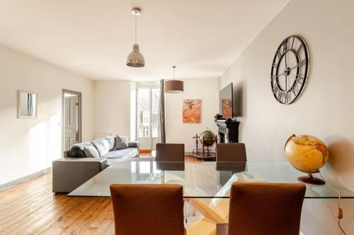 Гостиная зона в Bel appartement dans le centre historique avec wi-fi et toutes les commodités