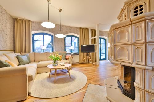 Ruang duduk di Boddenhuus - Traumhaus mit Steg und Boot
