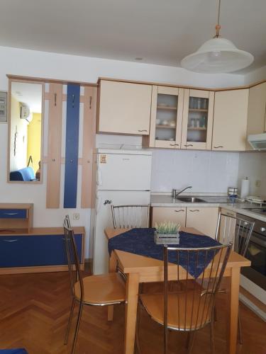 Kuchyň nebo kuchyňský kout v ubytování Apartman Martha