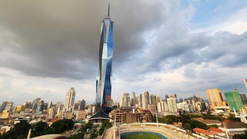 a view of the burj khalifa tallest building in the world at Opus Residences Kuala Lumpur by Infini Suites in Kuala Lumpur
