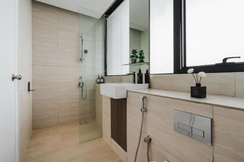 Koupelna v ubytování Lumi Tropicana Muji High Floor