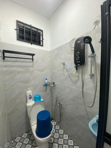 Koupelna v ubytování KZ Roomstay