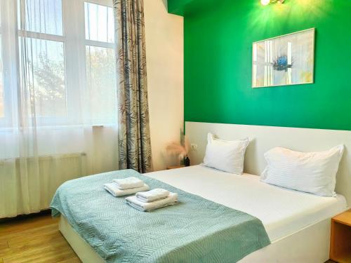 Postel nebo postele na pokoji v ubytování Comfort Apartments Timisoara