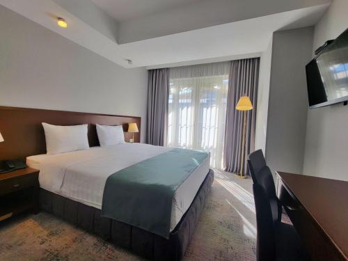 Postel nebo postele na pokoji v ubytování A5 Hotel