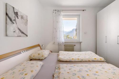 Postel nebo postele na pokoji v ubytování Apartment Rungg