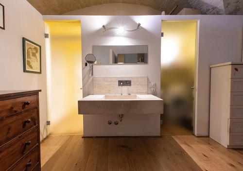 Un pat sau paturi într-o cameră la Casa Etrusca - Con Giardino e Vista - ItalyWeGo