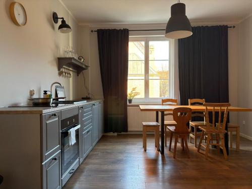 Kuchyň nebo kuchyňský kout v ubytování Apartament Stare Miasto Premium