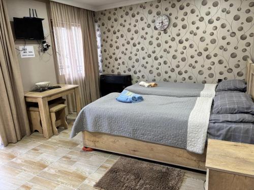 Postel nebo postele na pokoji v ubytování Guesthouse Saba