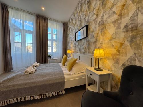 Postel nebo postele na pokoji v ubytování CENTER rooms