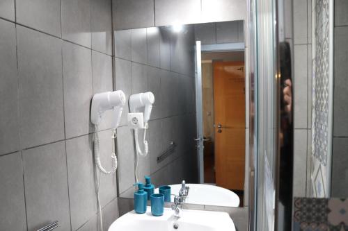Ένα μπάνιο στο Oportocean Suites