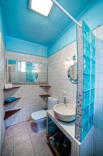 a bathroom with a sink and a toilet at Casa Emma in Valle Gran Rey