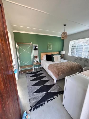 Ένα ή περισσότερα κρεβάτια σε δωμάτιο στο Bottlebrush Guest Suite, Newton Park