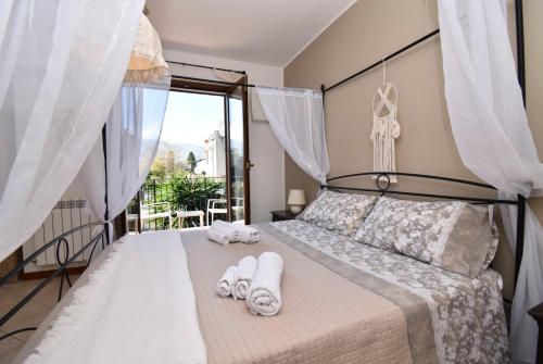 Postel nebo postele na pokoji v ubytování Casa Carini - Villa Vacanze sul Mare con piscina idromassaggio