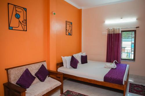 Ένα ή περισσότερα κρεβάτια σε δωμάτιο στο Kristi Guest House, Shantiniketan