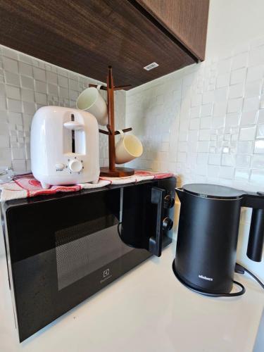 Η κουζίνα ή μικρή κουζίνα στο The viva patong condo C602