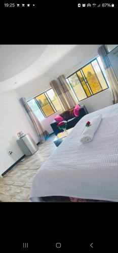 Postel nebo postele na pokoji v ubytování Andromeda lodge