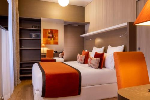 Ένα ή περισσότερα κρεβάτια σε δωμάτιο στο Hotel Pas De Calais