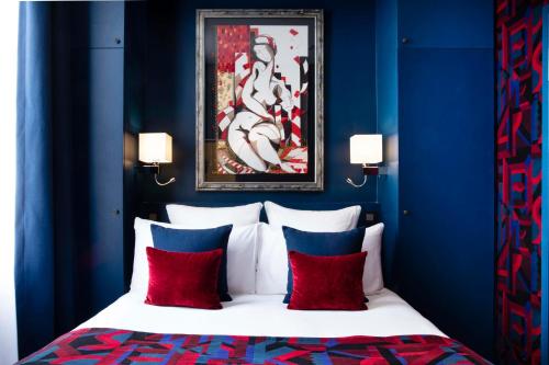Postel nebo postele na pokoji v ubytování Hotel Pas De Calais