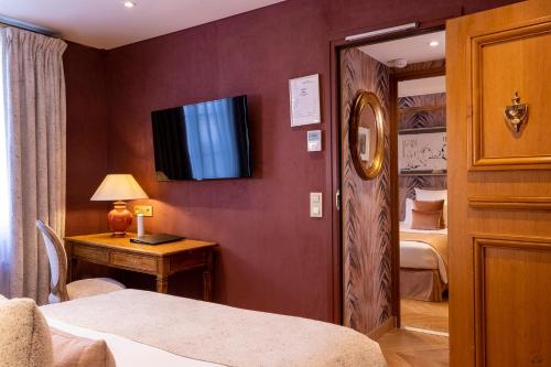 Ένα ή περισσότερα κρεβάτια σε δωμάτιο στο Hotel Pas De Calais