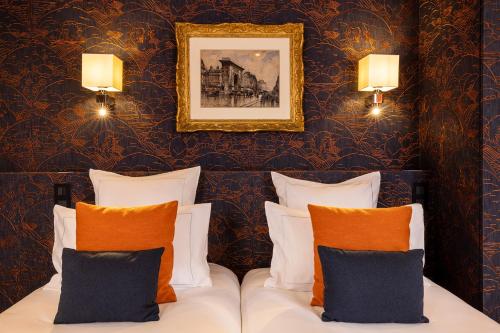 Ένα ή περισσότερα κρεβάτια σε δωμάτιο στο Hotel Pas De Calais