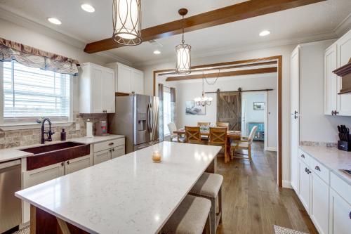a kitchen with white cabinets and a white counter top at Crossville Home Near Lake Tansi and Hiking Trails! in Crossville
