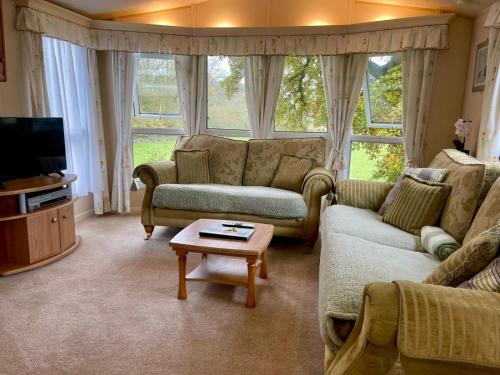 Χώρος καθιστικού στο Severnside Boat and Caravan Park Gloucestershire - Caravan 1