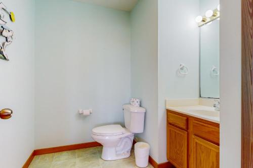 a bathroom with a toilet and a sink at Surfs Inn #35-5 in Avon