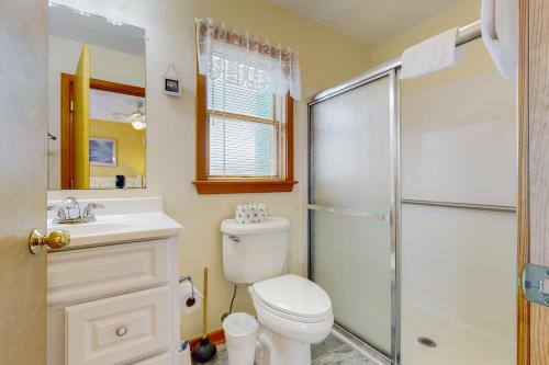 a bathroom with a toilet and a sink and a shower at Surfs Inn #35-5 in Avon