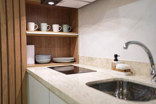 Cuina o zona de cuina de Urban Suite with Style and Views