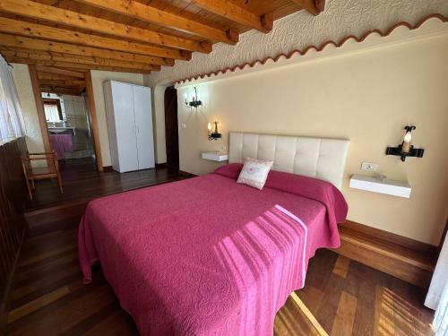 Postel nebo postele na pokoji v ubytování Finca el Castillo