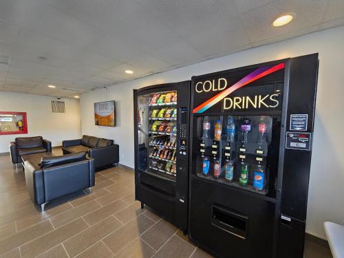 a cold drink machine in a waiting room at Residence & Conference Centre - North Bay in North Bay