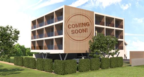 a building with a sign that reads coming soon at Schäfle Feldkirch-Altenstadt in Feldkirch