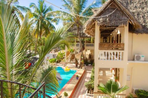 an aerial view of a resort with a swimming pool at Pamas Boutique Hotel in Michamvi