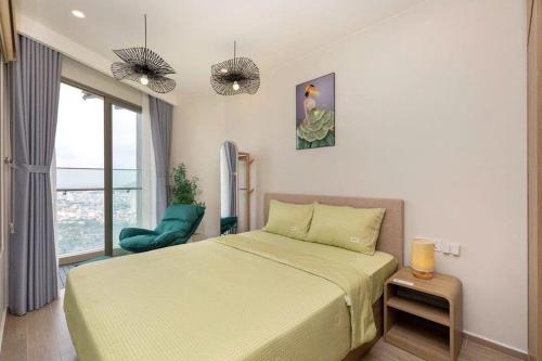 Кровать или кровати в номере The Song Vung Tau Bi Homestay & Spa
