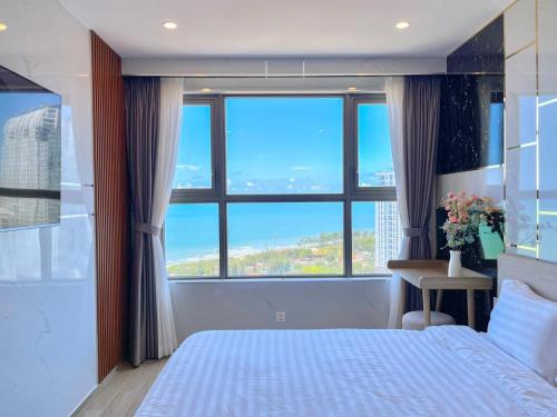 Кровать или кровати в номере The Song Vung Tau Bi Homestay & Spa