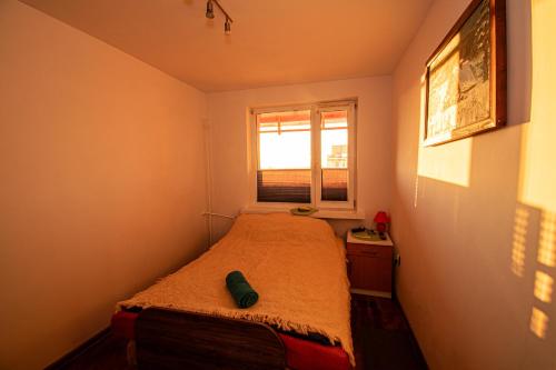 Postel nebo postele na pokoji v ubytování Cozy Apartment Reja