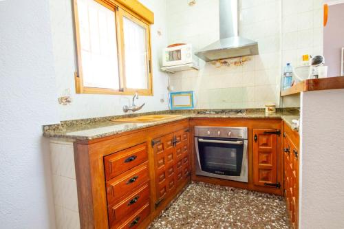 Η κουζίνα ή μικρή κουζίνα στο Casa Penya Fegina