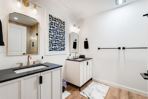 a white bathroom with a sink and a shower at Epic Mtn Views I Luxe 5br Alpine Escape in McGaheysville